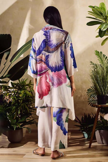 Shop Rainas White Viscose, Chiffon, Crepe Tassels Floral Print Asymmetric Kurta Pant Set at Aza Fashions Shop_Rainas_White Viscose, Chiffon, Crepe Tassels Floral Print Asymmetric Kurta Pant Set _at_Aza_Fashions