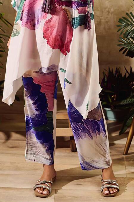 Rainas White Viscose, Chiffon, Crepe Tassels Floral Print Asymmetric Kurta Pant Set Online at Aza Fashions Rainas_White Viscose, Chiffon, Crepe Tassels Floral Print Asymmetric Kurta Pant Set _Online_at_Aza_Fashions