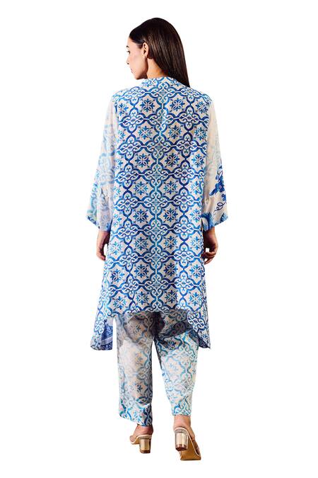 Rainas Blue Cotton, Silk Tassels Mandarin Botanical Print Asymmetric Kurta With Pant Online at Aza Fashions Rainas_Blue Cotton, Silk Tassels Mandarin Botanical Print Asymmetric Kurta With Pant_Online_at_Aza_Fashions