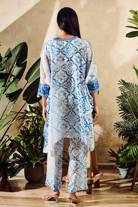 Shop Rainas Blue Cotton, Silk Embroidery Round Neck Floral Bloom Print Kaftan With Pant at Aza Fashions Shop_Rainas_Blue Cotton, Silk Embroidery Round Neck Floral Bloom Print Kaftan With Pant_at_Aza_Fashions