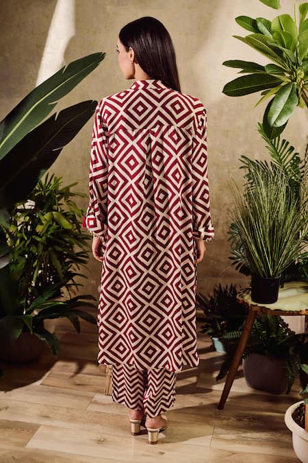 Shop Rainas Maroon Satin, Chiffon Tassels Collared Geometric Print Tunic And Pant Set at Aza Fashions Shop_Rainas_Maroon Satin, Chiffon Tassels Collared Geometric Print Tunic And Pant Set_at_Aza_Fashions