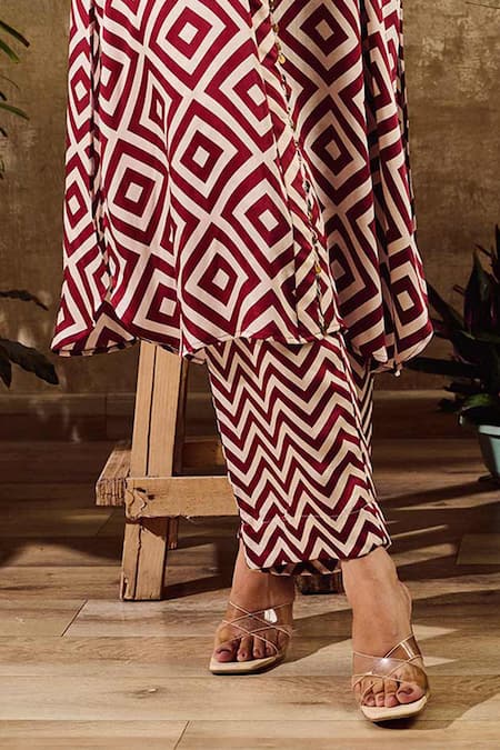 Rainas Maroon Satin, Chiffon Tassels Collared Geometric Print Tunic And Pant Set at Aza Fashions Rainas_Maroon Satin, Chiffon Tassels Collared Geometric Print Tunic And Pant Set_at_Aza_Fashions