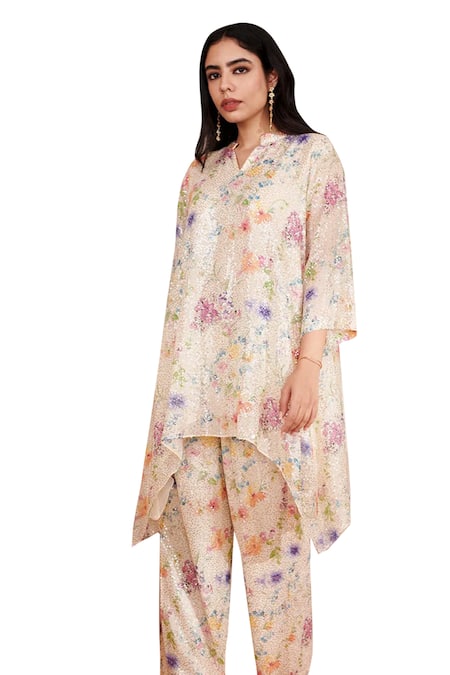 Shop Rainas Multi Color Georgette Sequins Mandarin Printed Asymmetric Tunic With Pant at Aza Fashions Shop_Rainas_Multi Color Georgette Sequins Mandarin Printed Asymmetric Tunic With Pant_at_Aza_Fashions