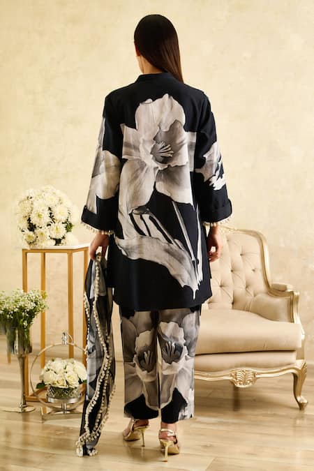 Shop Rainas Black Linen, Chiffon Lace Mandarin Collar Lily Flower Print Tunic Pant Set at Aza Fashions Shop_Rainas_Black Linen, Chiffon Lace Mandarin Collar Lily Flower Print Tunic Pant Set_at_Aza_Fashions