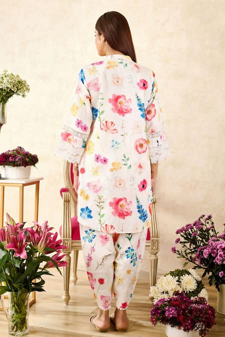 Shop Rainas Off White Linen Lace Mandarin Collar Poppy Print Tunic With Tulip Pant at Aza Fashions Shop_Rainas_Off White Linen Lace Mandarin Collar Poppy Print Tunic With Tulip Pant_at_Aza_Fashions