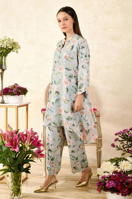 Rainas Blue Georgette Embroidery, Sequins Rose Print Asymmetric Tunic With Pant at Aza Fashions Rainas_Blue Georgette Embroidery, Sequins Rose Print Asymmetric Tunic With Pant_at_Aza_Fashions