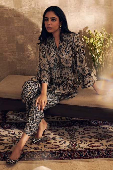 Shop Rainas Black Georgette Sequins Mandarin Collar Tunic And Pant Set at Aza Fashions Shop_Rainas_Black Georgette Sequins Mandarin Collar Tunic And Pant Set _at_Aza_Fashions