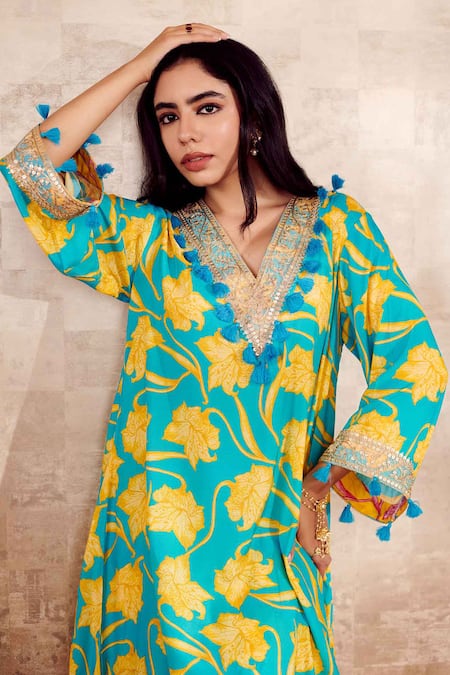 Shop Rainas Blue Cotton, Silk Tassels V-neck Floral Print Kurta And Pant Set at Aza Fashions Shop_Rainas_Blue Cotton, Silk Tassels V-neck Floral Print Kurta And Pant Set_at_Aza_Fashions