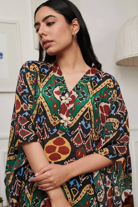 Rainas Green Cotton, Silk V-neck Tribal Ikat Print Kaftan With Striped Pant Online at Aza Fashions Rainas_Green Cotton, Silk V-neck Tribal Ikat Print Kaftan With Striped Pant_Online_at_Aza_Fashions