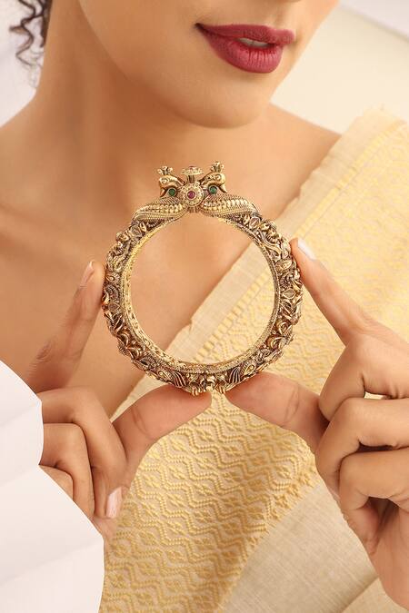 Shop SUIKALA Gold Plated Stones Carved Peacock Temple Kada Online at Aza Fashions Shop_SUIKALA_Gold Plated Stones Carved Peacock Temple Kada_Online_at_Aza_Fashions