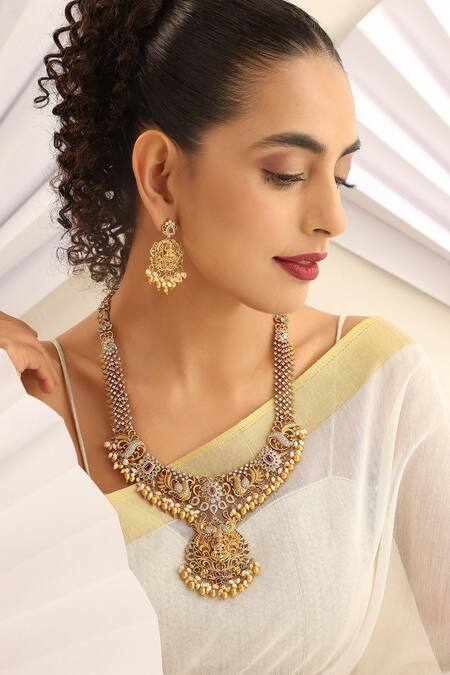 Shop_SUIKALA_Gold Plated Pearls, Stones Laxmi Studded Long Necklace Set _Online_at_Aza_Fashions