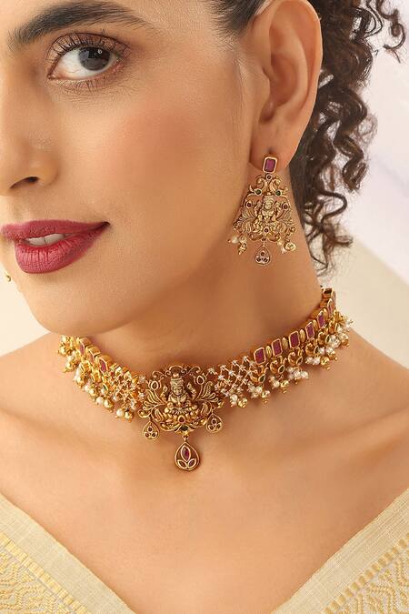 Buy SUIKALA Gold Plated Pearls, Stones Laxmiji Carved Choker Necklace Set Online at Aza Fashions Buy_SUIKALA_Gold Plated Pearls, Stones Laxmiji Carved Choker Necklace Set_Online_at_Aza_Fashions