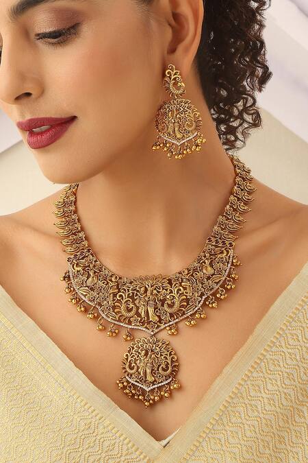 Buy_SUIKALA_Gold Plated Stones Radha-krishna Carved Long Temple Necklace Set_Online_at_Aza_Fashions