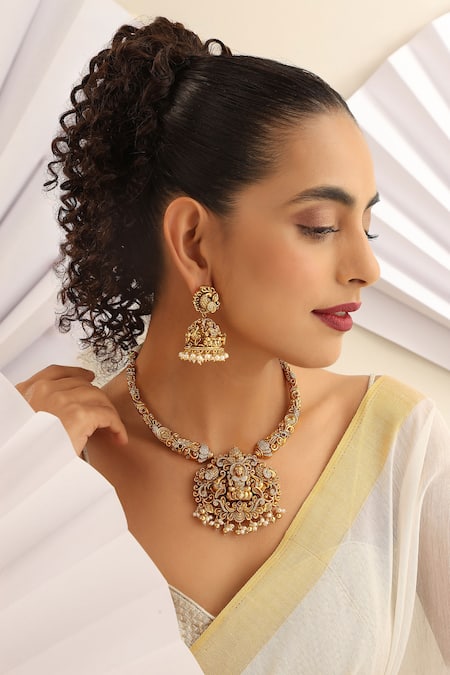 Shop SUIKALA Gold Plated Pearls, Stones Laxmiji Carved Temple Hasli Necklace Set Online at Aza Fashions Shop_SUIKALA_Gold Plated Pearls, Stones Laxmiji Carved Temple Hasli Necklace Set _Online_at_Aza_Fashions