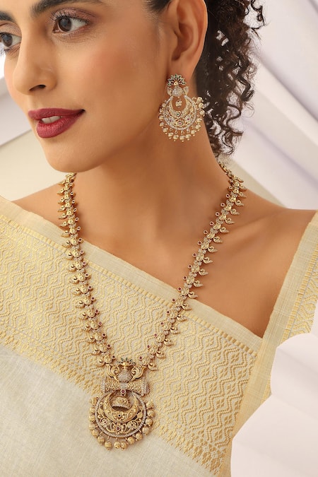 Buy SUIKALA Gold Plated Stones, Beads Peacock Studded Temple Long Necklace Set Online at Aza Fashions Buy_SUIKALA_Gold Plated Stones, Beads Peacock Studded Temple Long Necklace Set_Online_at_Aza_Fashions