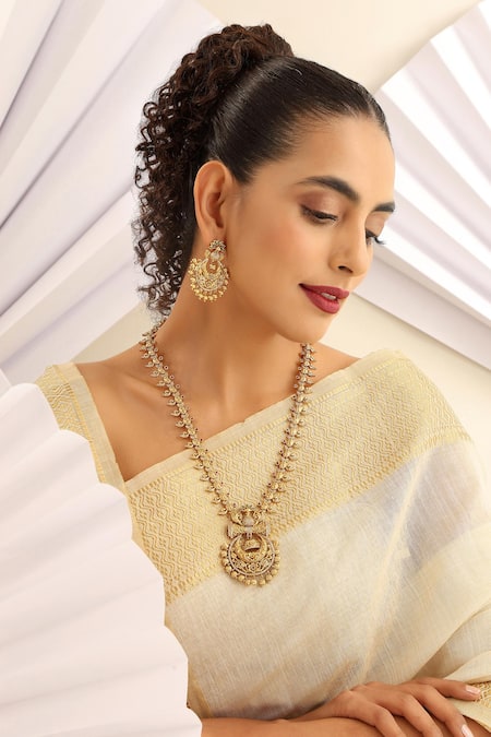 Shop SUIKALA Gold Plated Stones, Beads Peacock Studded Temple Long Necklace Set Online at Aza Fashions Shop_SUIKALA_Gold Plated Stones, Beads Peacock Studded Temple Long Necklace Set_Online_at_Aza_Fashions