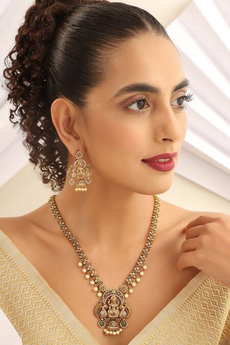 Shop SUIKALA Green Pearls, Stones Laxmiji Studded Temple Necklace Set Online at Aza Fashions Shop_SUIKALA_Green Pearls, Stones Laxmiji Studded Temple Necklace Set_Online_at_Aza_Fashions