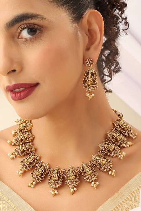 Buy_SUIKALA_Gold Plated Pearls, Stones Carved Temple Necklace Set _Online_at_Aza_Fashions