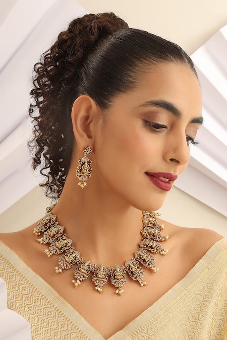Shop_SUIKALA_Gold Plated Pearls, Stones Carved Temple Necklace Set _Online_at_Aza_Fashions