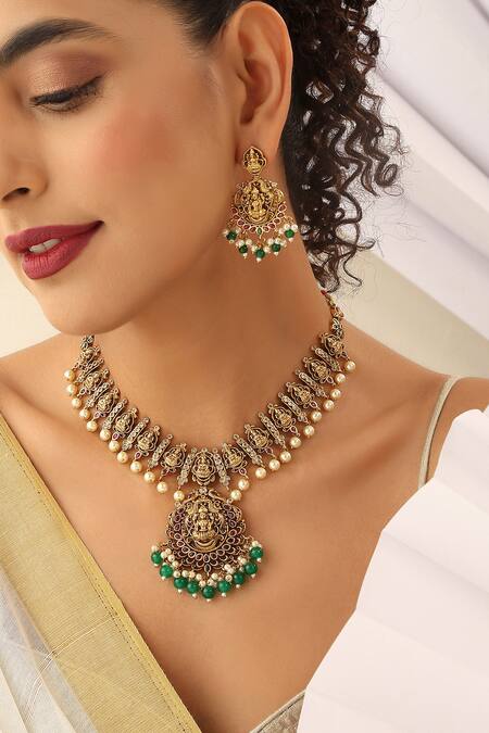 Buy SUIKALA Green Pearls Carved Goddess Motif Temple Necklace Set Online at Aza Fashions Buy_SUIKALA_Green Pearls Carved Goddess Motif Temple Necklace Set_Online_at_Aza_Fashions
