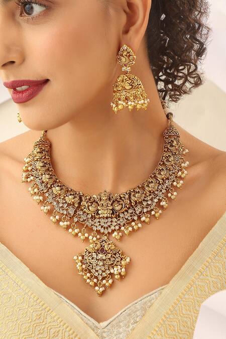 Buy_SUIKALA_Gold Plated Goddess Carved Motif Temple Necklace Set_Online_at_Aza_Fashions