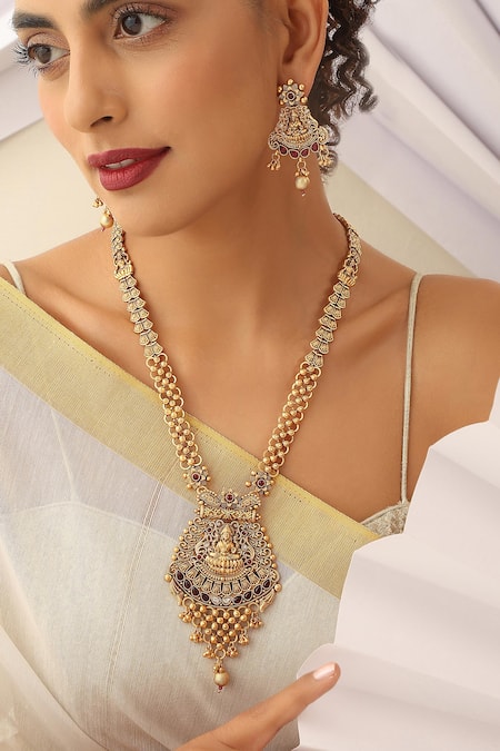 Buy_SUIKALA_Gold Plated Stones Goddess Carved Motif Long Temple Necklace Set _Online_at_Aza_Fashions
