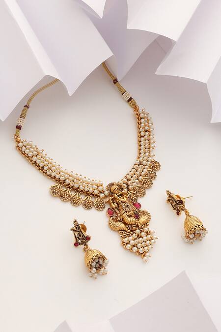 Shop SUIKALA Red Pearls Lord Krishna Carved Temple Necklace Set at Aza Fashions Shop_SUIKALA_Red Pearls Lord Krishna Carved Temple Necklace Set_at_Aza_Fashions