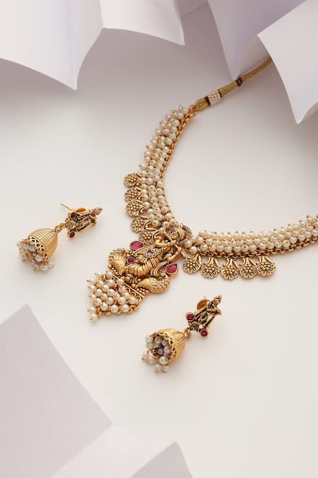Buy SUIKALA Red Pearls Lord Krishna Carved Temple Necklace Set Online at Aza Fashions Buy_SUIKALA_Red Pearls Lord Krishna Carved Temple Necklace Set_Online_at_Aza_Fashions
