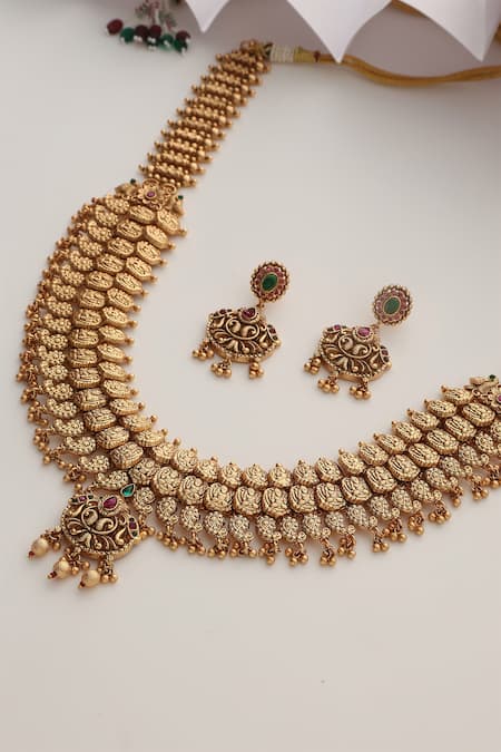 Buy SUIKALA Gold Plated Stones Layered Motif Carved Necklace Set Online at Aza Fashions Buy_SUIKALA_Gold Plated Stones Layered Motif Carved Necklace Set _Online_at_Aza_Fashions
