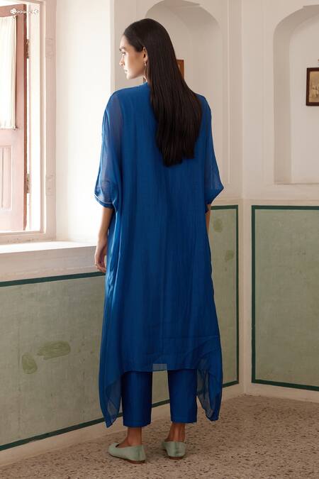 Shop Vaayu Blue Muslin, Cotton Embroidery Floral Applique Work Asymmetric Kurta And Pant Set at Aza Fashions Shop_Vaayu_Blue Muslin, Cotton Embroidery Floral Applique Work Asymmetric Kurta And Pant Set_at_Aza_Fashions