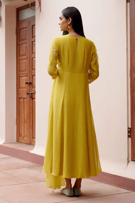 Shop_Vaayu_Yellow Muslin Embroidery, Tassels Round Neck Floral Anarkali With Dupatta _at_Aza_Fashions