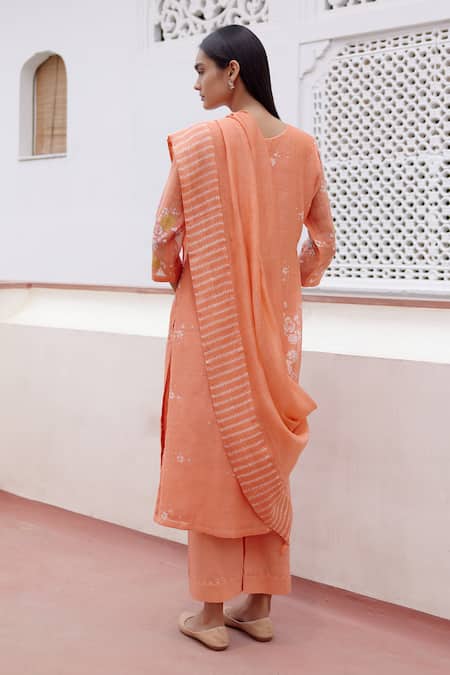 Shop_Vaayu_Peach Muslin, Cotton Embroidery Round Floral Print Thread Work Kurta Pant Set _at_Aza_Fashions