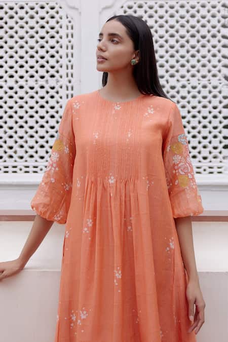 Vaayu_Peach Muslin, Cotton Embroidery Round Neck Floral Applique Dress_at_Aza_Fashions