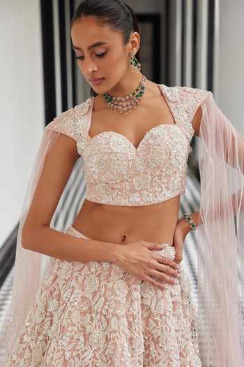 Istya_Pink Net Sequins, Cut Work Sweetheart Floral Embroidered Lehenga With Blouse _Online_at_Aza_Fashions