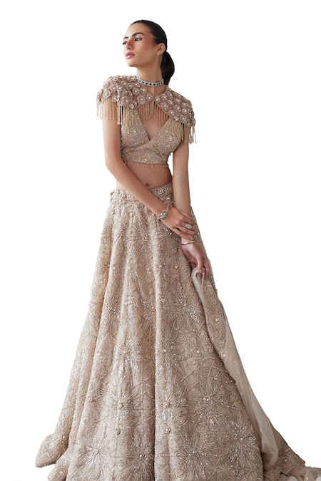 Shop Istya Beige Net Beads, Sequins, Embroidery, Cut Floral Bridal Lehenga And Cape Set Online at Aza Fashions Shop_Istya_Beige Net Beads, Sequins, Embroidery, Cut Floral Bridal Lehenga And Cape Set _Online_at_Aza_Fashions