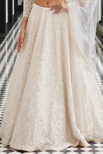 Buy_Istya_Ivory Net Sequins, Embroidery Plunge Neck Floral Hand Lehenga Set _Online_at_Aza_Fashions