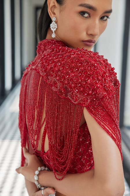 Istya Red Satin Sequins, Cut Work Sweetheart Neck Crystal Embellished Cape And Skirt Set Online at Aza Fashions Istya_Red Satin Sequins, Cut Work Sweetheart Neck Crystal Embellished Cape And Skirt Set _Online_at_Aza_Fashions