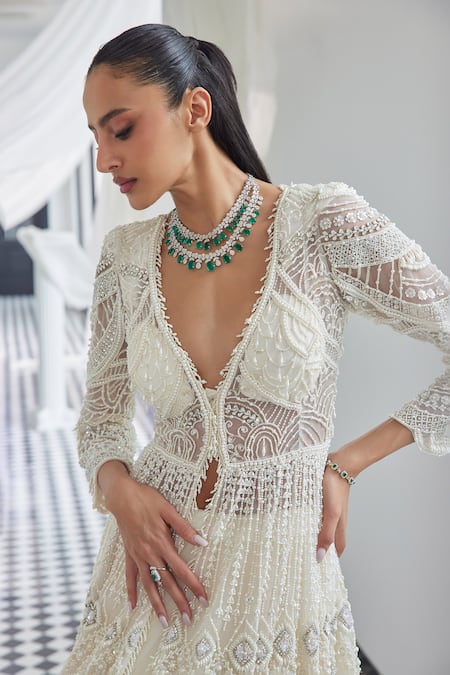 Istya Ivory Net Pearls, Stones Plunge Neck Embellished Jacket And Skirt Set Online at Aza Fashions Istya_Ivory Net Pearls, Stones Plunge Neck Embellished Jacket And Skirt Set _Online_at_Aza_Fashions