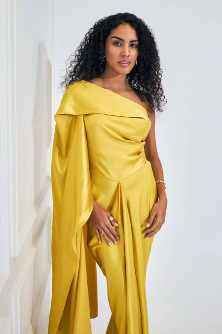 NA-KA_Yellow Satin Asymmetric Flare Trail Side Top Maxi Dress _Online_at_Aza_Fashions