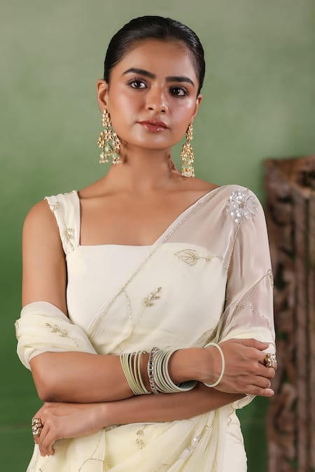 Shop Geroo Jaipur Off White Chiffon Sequins Floral Embroidered Saree With Unstitched Blouse Piece Online at Aza Fashions Shop_Geroo Jaipur_Off White Chiffon Sequins Floral Embroidered Saree With Unstitched Blouse Piece _Online_at_Aza_Fashions