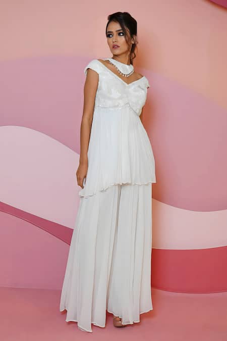 Vedika Soni Ivory Crepe, Georgette Cut Work, Cutdana Crystals Hand Peplum Kurta Sharara Set at Aza Fashions Vedika Soni_Ivory Crepe, Georgette Cut Work, Cutdana Crystals Hand Peplum Kurta Sharara Set _at_Aza_Fashions