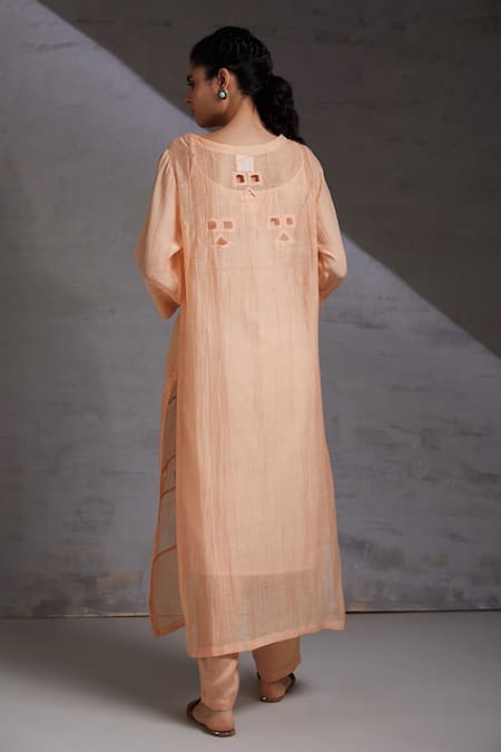 Shop_Shikha Malik_Peach Silk, Chanderi Cut Work Round Neck Chandra Pintuck Detailed Kurta Set _at_Aza_Fashions