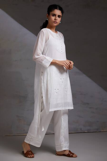 Shikha Malik White Silk, Chanderi Cut Work Round Neck Loka Side Tie-up Kurta Set at Aza Fashions Shikha Malik_White Silk, Chanderi Cut Work Round Neck Loka Side Tie-up Kurta Set _at_Aza_Fashions