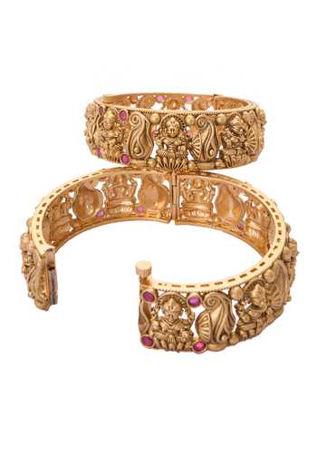 Shop Nazaakat By Samara Singh Gold Plated Stones Carved Laxmi Jadau Bangles-Set of 2 Online at Aza Fashions Shop_Nazaakat By Samara Singh_Gold Plated Stones Carved Laxmi Jadau Bangles-Set of 2 _Online_at_Aza_Fashions