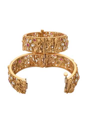 Shop Nazaakat By Samara Singh Gold Plated Stones Carved Bride Jadau Bangles-Set of 2 Online at Aza Fashions Shop_Nazaakat By Samara Singh_Gold Plated Stones Carved Bride Jadau Bangles-Set of 2 _Online_at_Aza_Fashions