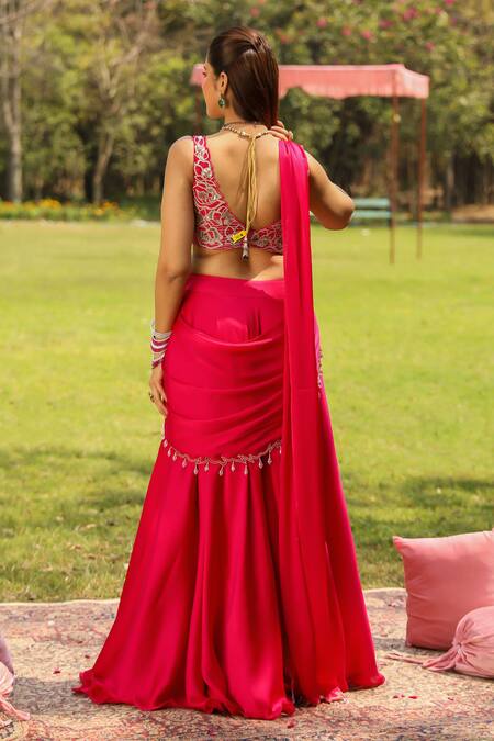 Shop Ajiesh Oberoi Pink Chiffon, Satin Cut Work, Tassels Karishma Draped Sharara Saree With Blouse at Aza Fashions Shop_Ajiesh Oberoi_Pink Chiffon, Satin Cut Work, Tassels Karishma Draped Sharara Saree With Blouse _at_Aza_Fashions