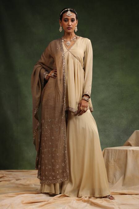 Buy_Charu Makkar_Beige Muslin, Silk Embroidery Over The Taupe Gathered Peplum Kurta Gharara Set _Online_at_Aza_Fashions