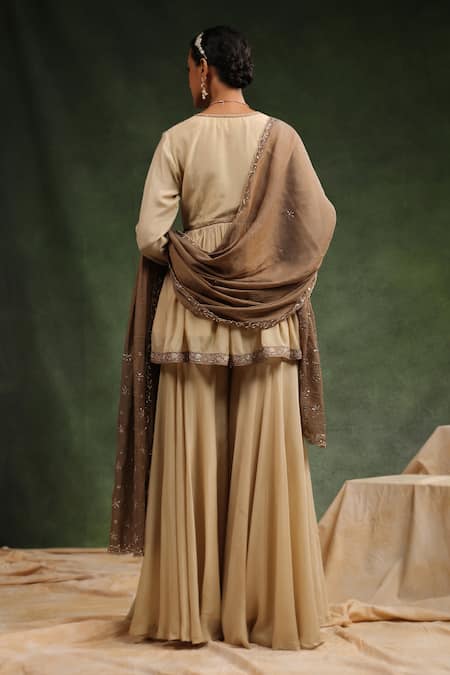 Charu Makkar_Beige Muslin, Silk Embroidery Over The Taupe Gathered Peplum Kurta Gharara Set _Online_at_Aza_Fashions