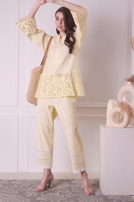 Surabhi Arya_Yellow Cotton Cut Work, Lace Collared, V-neck Cutwork Hem Shirt And Pant Set _at_Aza_Fashions