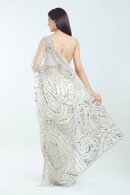 Shop Seema Gujral White Silk Mirrors, Zari, Embroidery Plunge Neck Paisley Saree With Blouse at Aza Fashions Shop_Seema Gujral_White Silk Mirrors, Zari, Embroidery Plunge Neck Paisley Saree With Blouse_at_Aza_Fashions